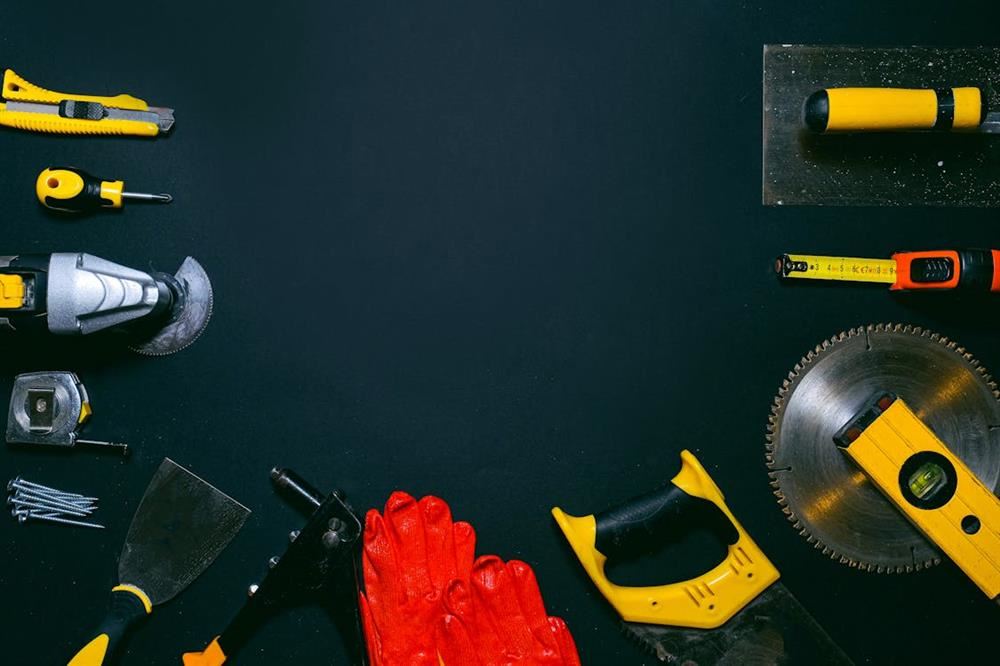  various construction tools and gloves