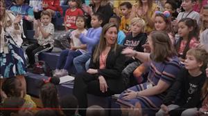 screenshot of  youtube video showing Shainer Brenner being surprised by award