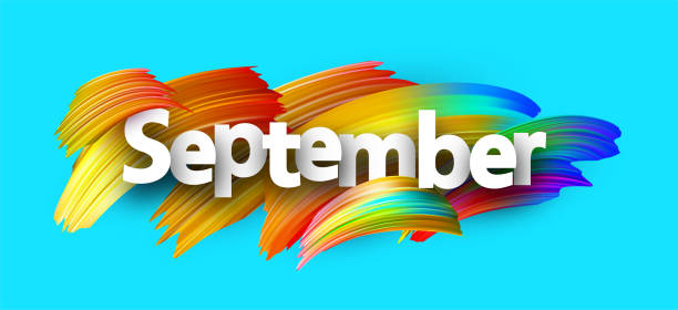  the word September with a blue background and rainbow paint