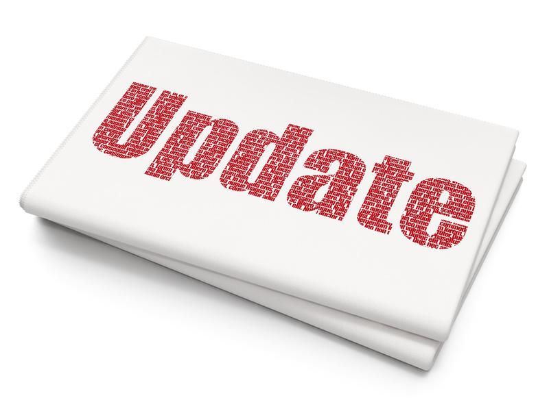  folded paper with the word Update on it