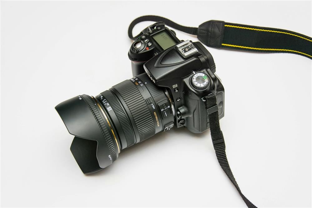  black camera with strap 